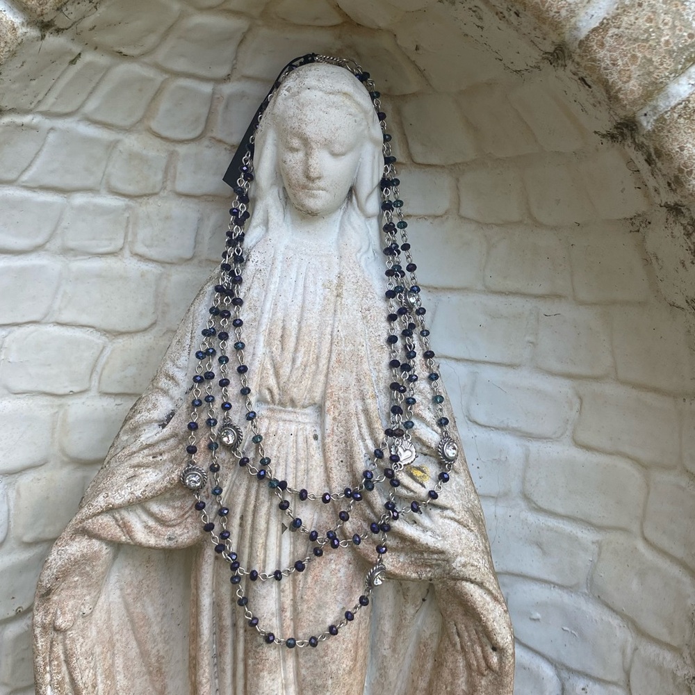 New w/tag Virgins Saints and Angels Magdalena beaded 4 strand silver necklace.